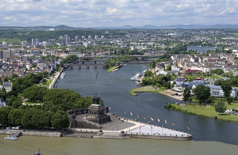 The German Corner (Deutsches Eck) at the confluence of Rhine and Mosel rivers in Koblenz with equestrian statue of William the Great, Germany