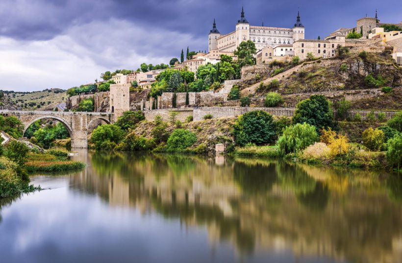 Toledo, Spain town skyline on the Tagus River.